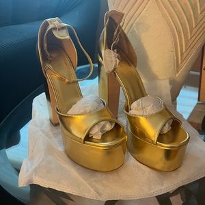 Gold platform heels